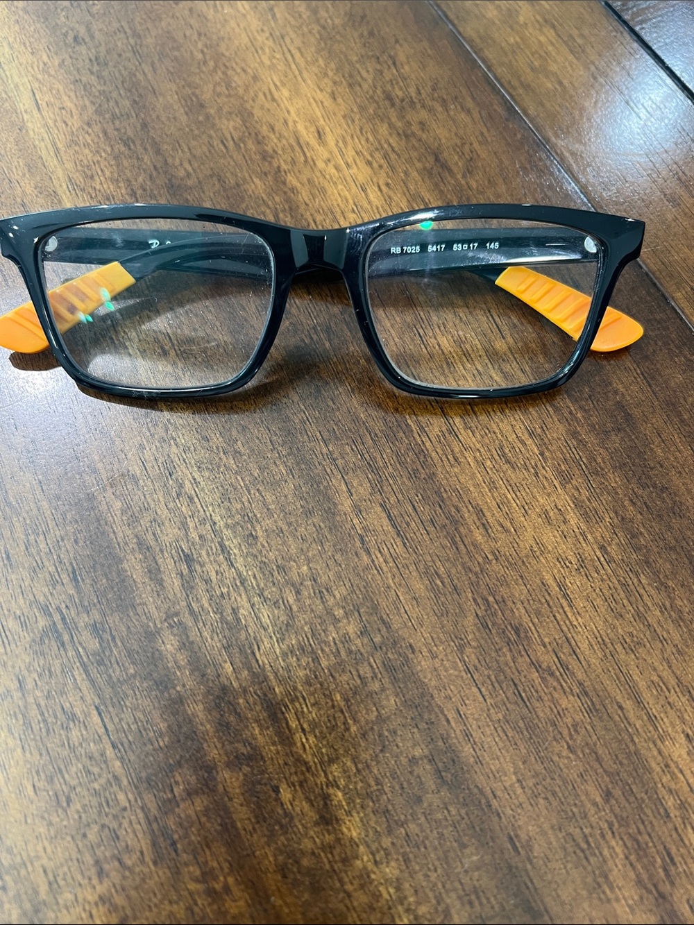 Ray-Ban Black Frames with Orange Temple Accents